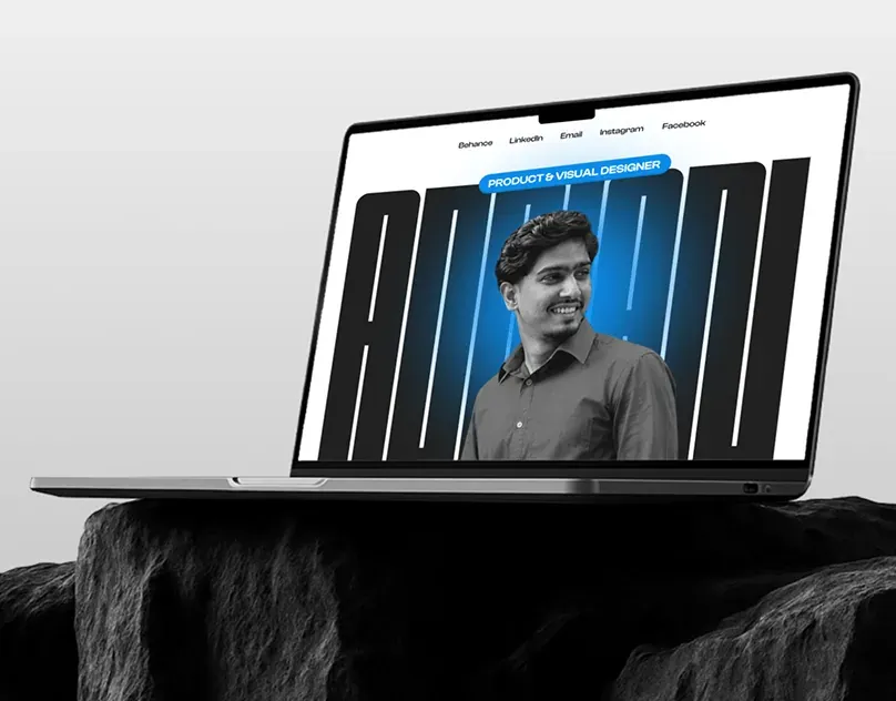 Black and blue portfolio website with oversized type behind a portrait